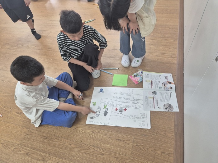 El districte de Guro ajuda l'educació comunitària infantil amb un butlletí
