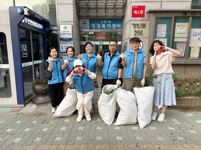 El Comitè d'Autogestió dels Residents de Dohwa 1-dong, 'El nostre barri estrena cara nova'…Millora de l'entorn dels carrers